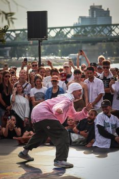 Exciting street dance battle by the Danube River in Bratislava, Slovakia.