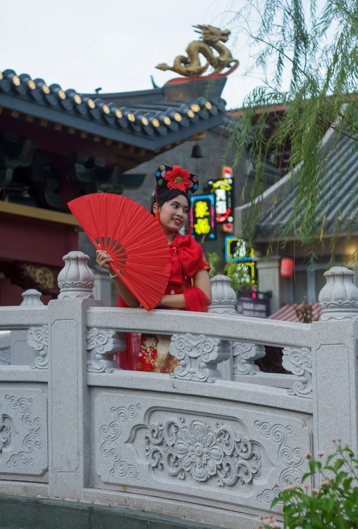 Traditional Chinese costume in front of historic architecture