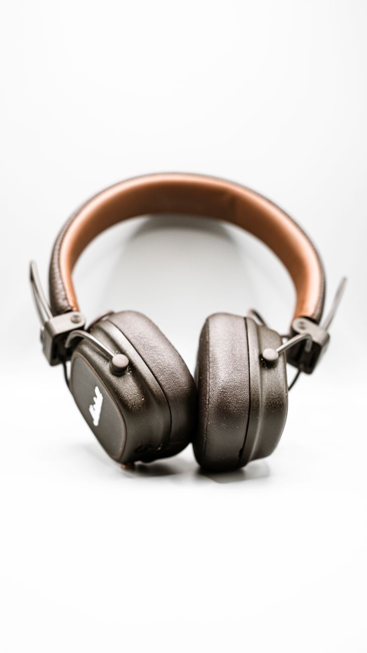 Close-up of vintage brown headphones showcasing classic design and texture.