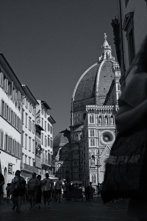 Free Black and white photo of Santa Maria del Fiore with people strolling. Stock Photo