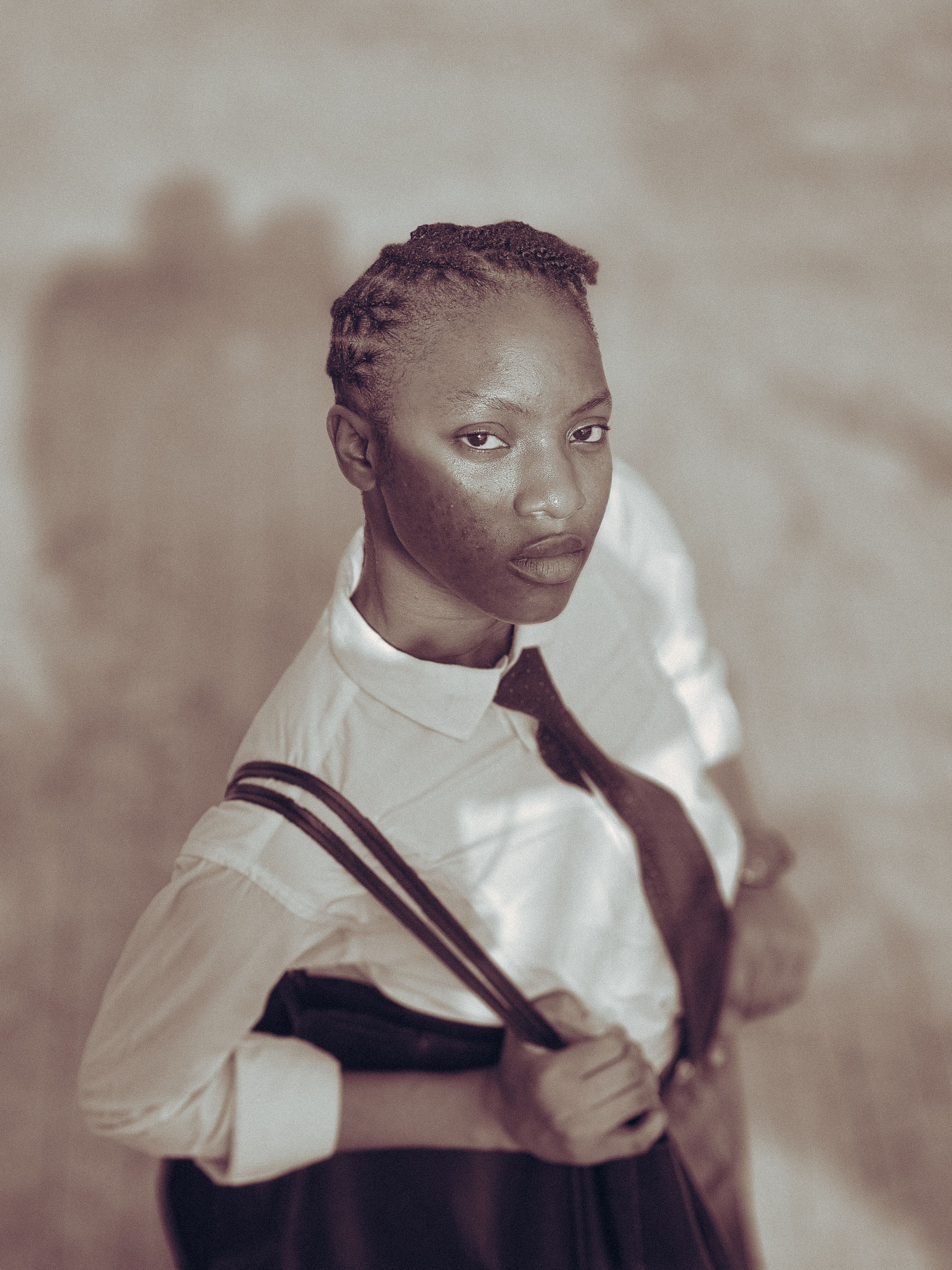 Elegant Portrait of Young Woman in Sepia Tone · Free Stock Photo