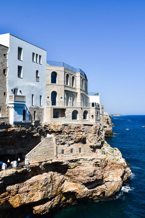 Free Picturesque architecture along the cliffs of Polignano a Mare, Italy. Stock Photo