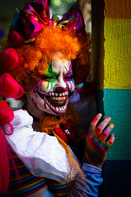 Free Colorful clown with horror makeup in Mexico City. Vivid colors and creative cosplay. Stock Photo