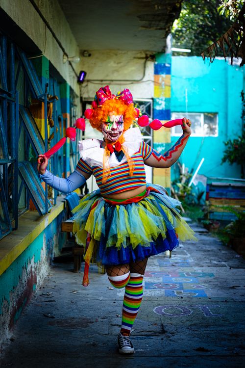 Colorful Clown Cosplay in Urban Setting Free Stock Photo Colorful Clown Cosplay in Urban Setting Free Stock Photo