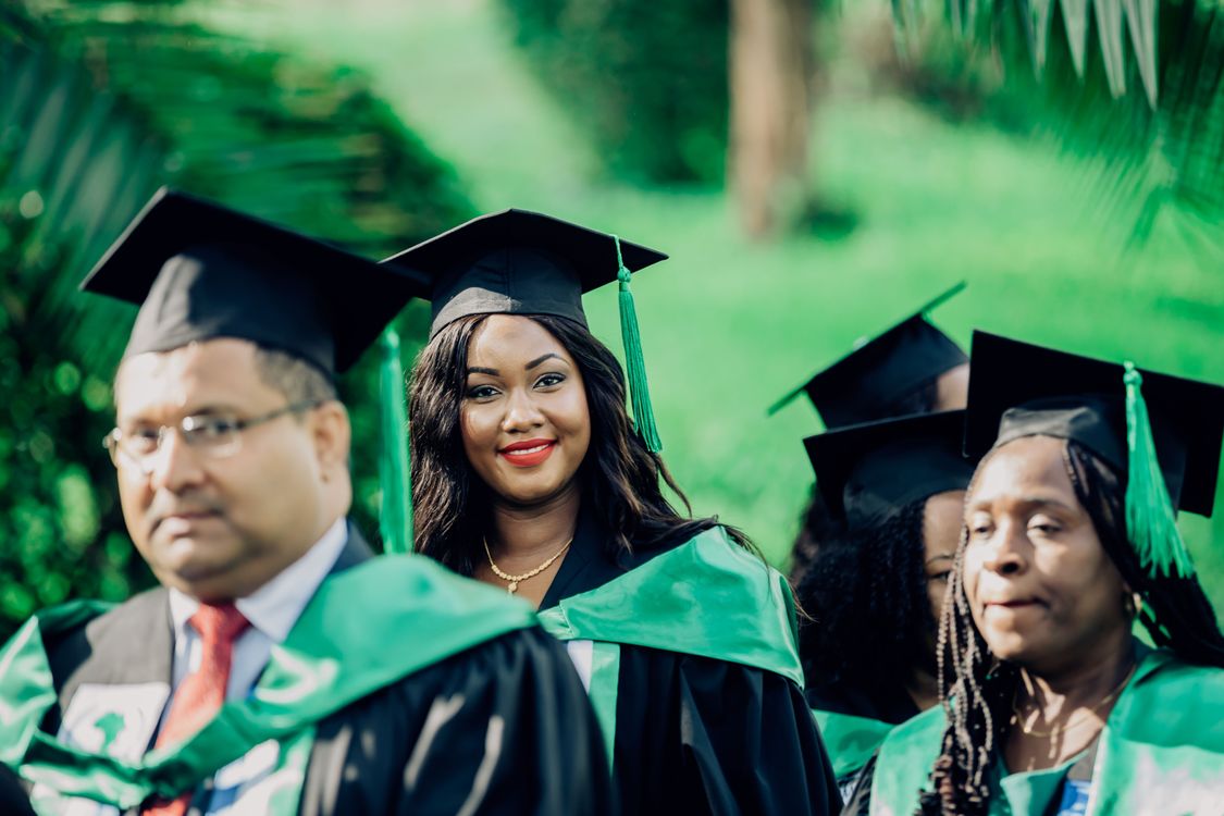 Graduates Bunch Group of Graduates Celebrating Outdoors · Free Stock Photo