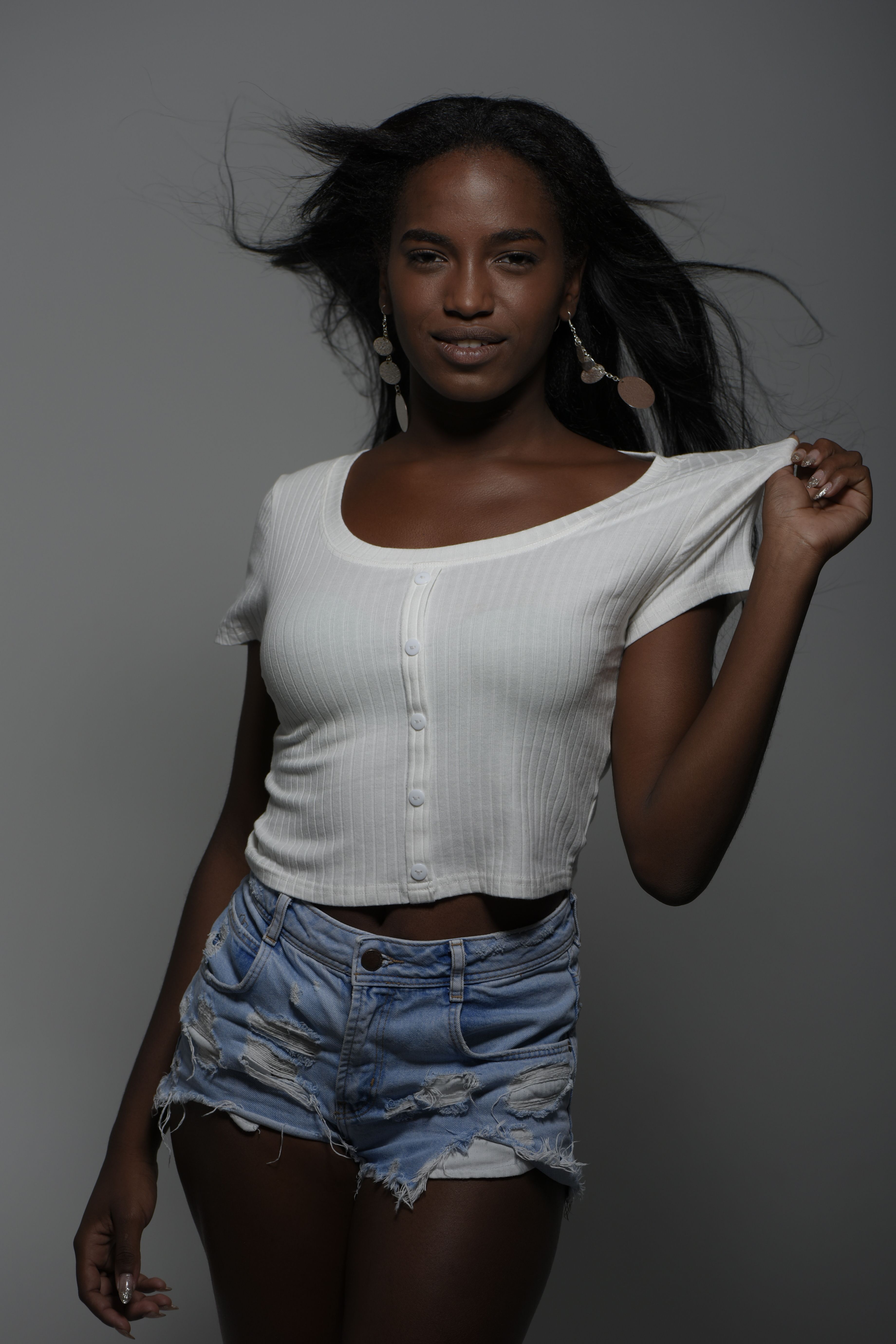 Stylish Portrait of a Young Woman in Casual Clothing · Free Stock Photo