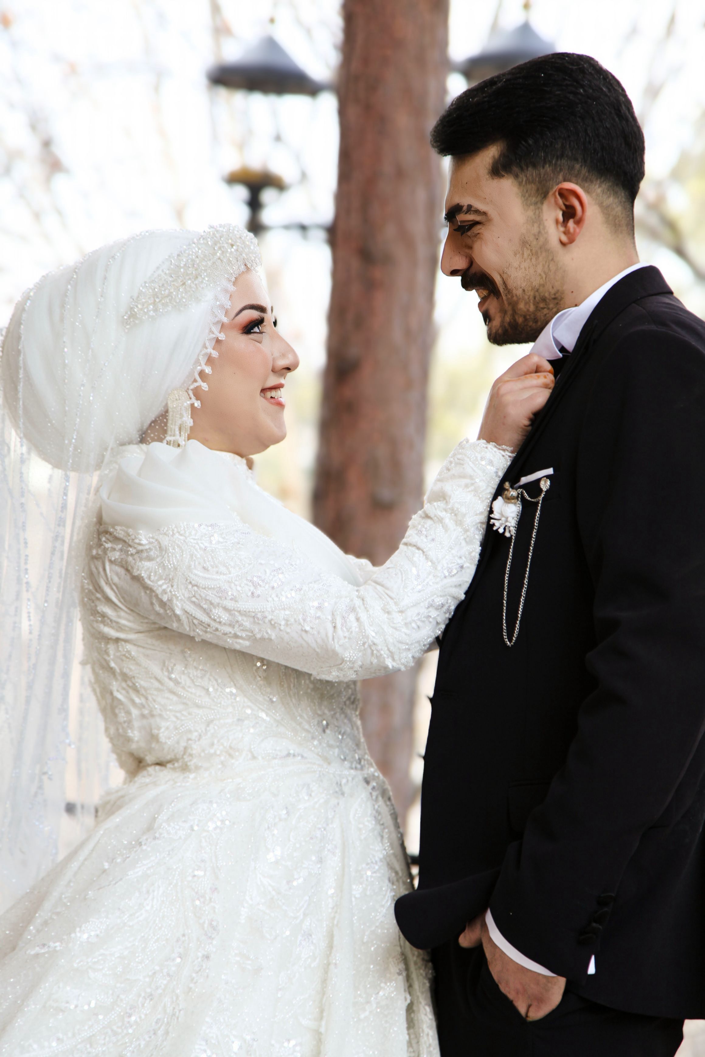 Muslim bride and groom outdoors on their wedding day