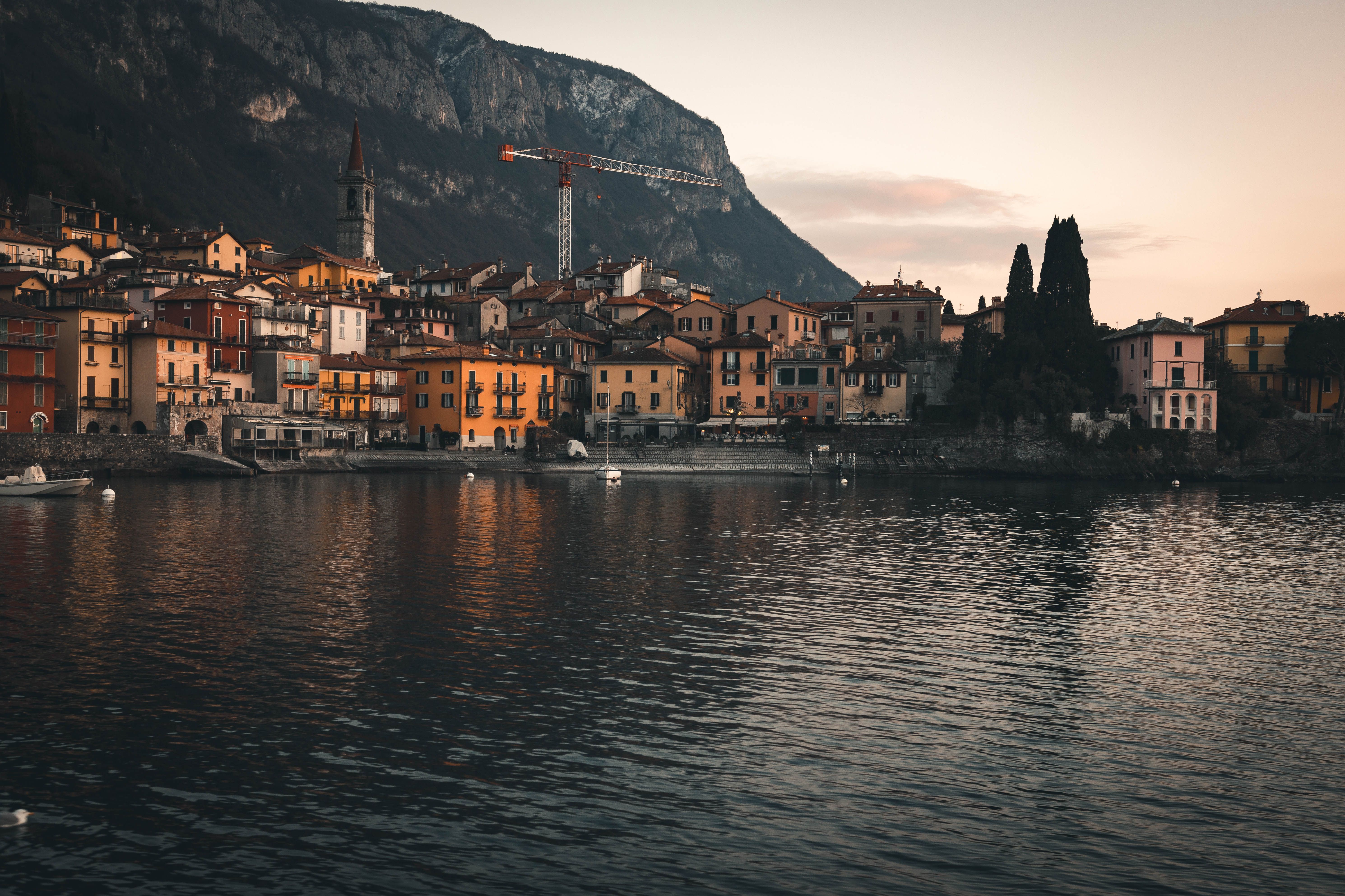 Discover the picturesque beauty of Lake Como with colorful architecture under the majestic mountains.