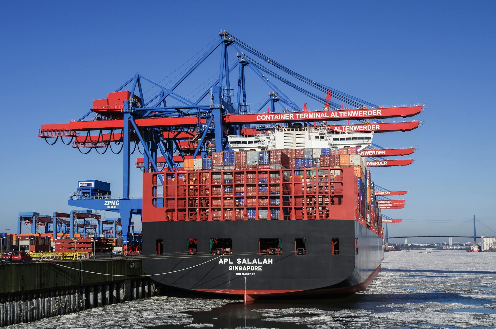 A cargo ship docked at Container Terminal Altenwerder in Hamburg, Germany.
