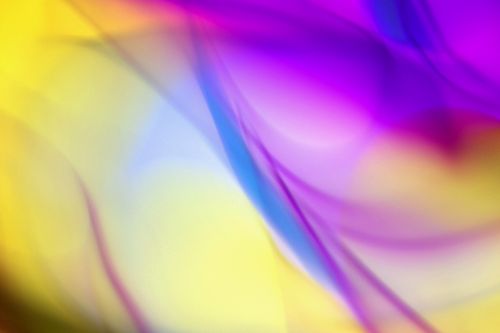 Free Colorful abstract waves in yellow, purple, and blue, creating a vibrant visual appeal. Stock Photo