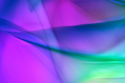 A dynamic and colorful abstract wave pattern with vibrant hues.