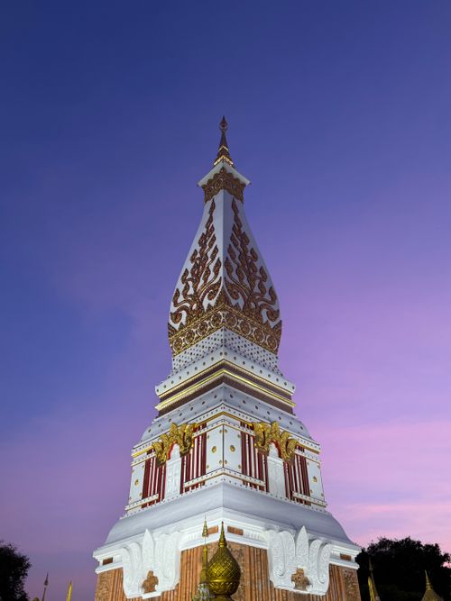Free Stunning view of the sacred Wat Phra That Phanom stupa at sunset in Nakhon Phanom, Thailand. Stock Photo