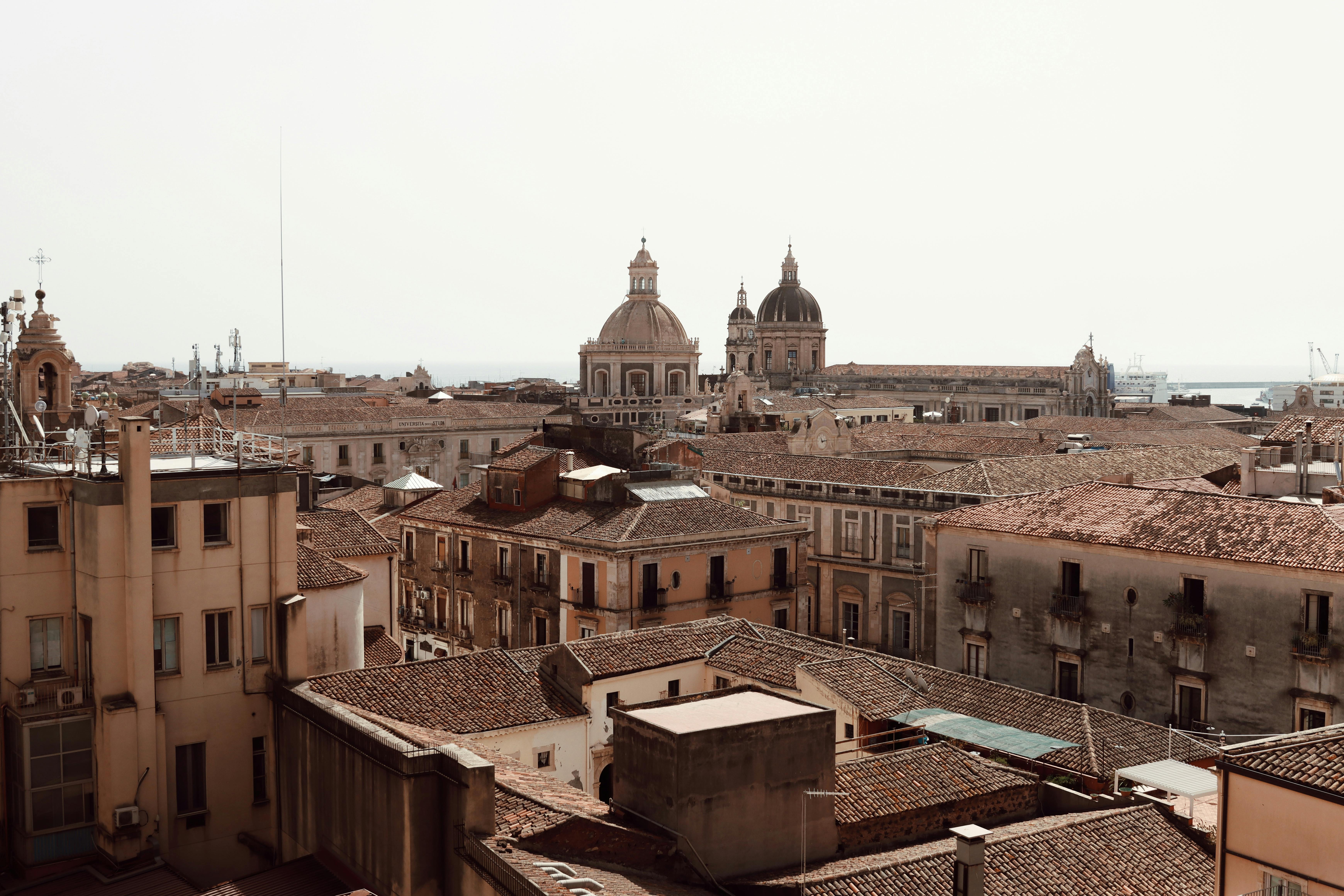 Aerial view of Catania, Sicily showcasing its ancient architecture and iconic domes.
