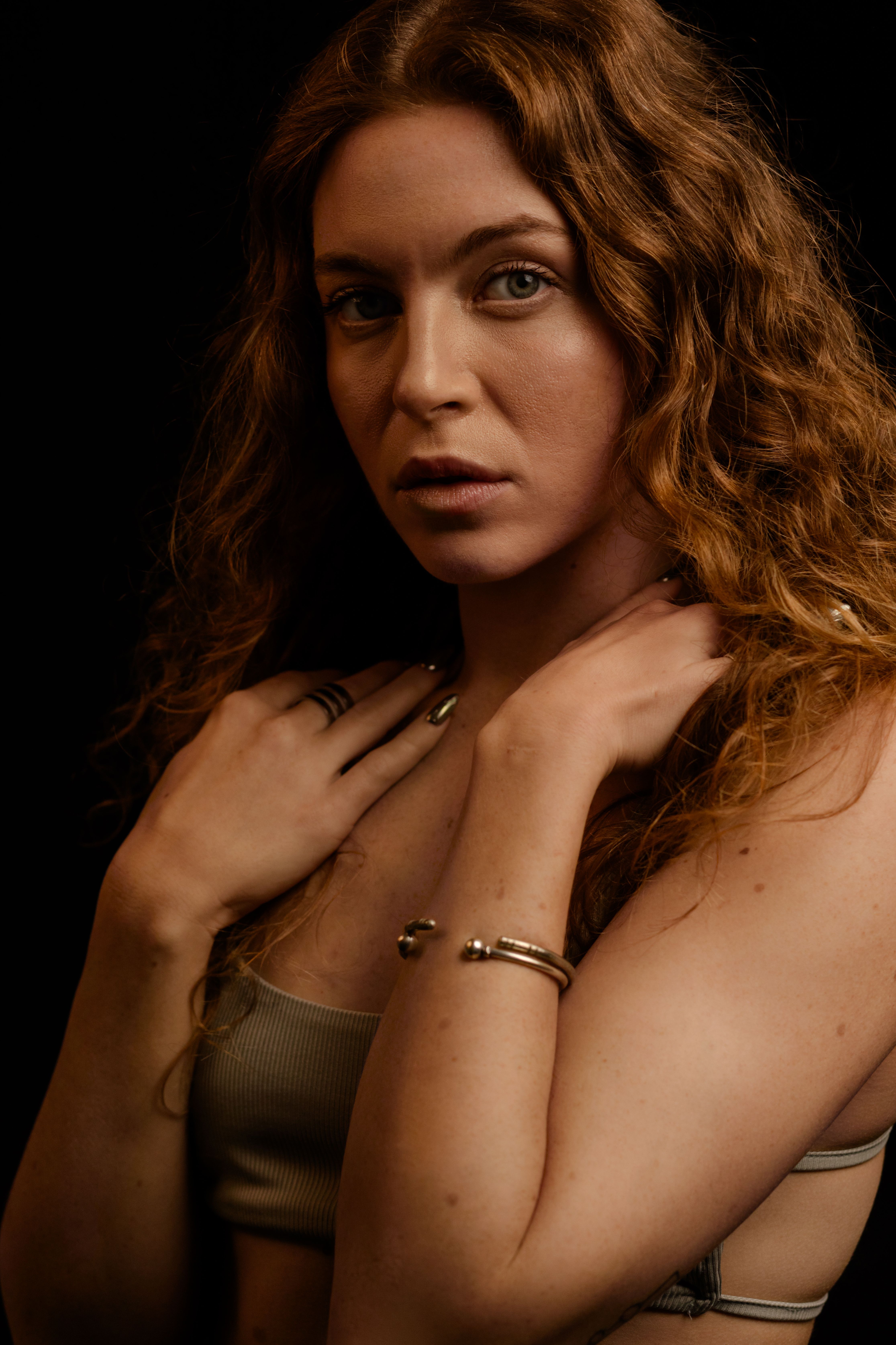 Portrait of Woman with Red Hair in Low Light · Free Stock Photo