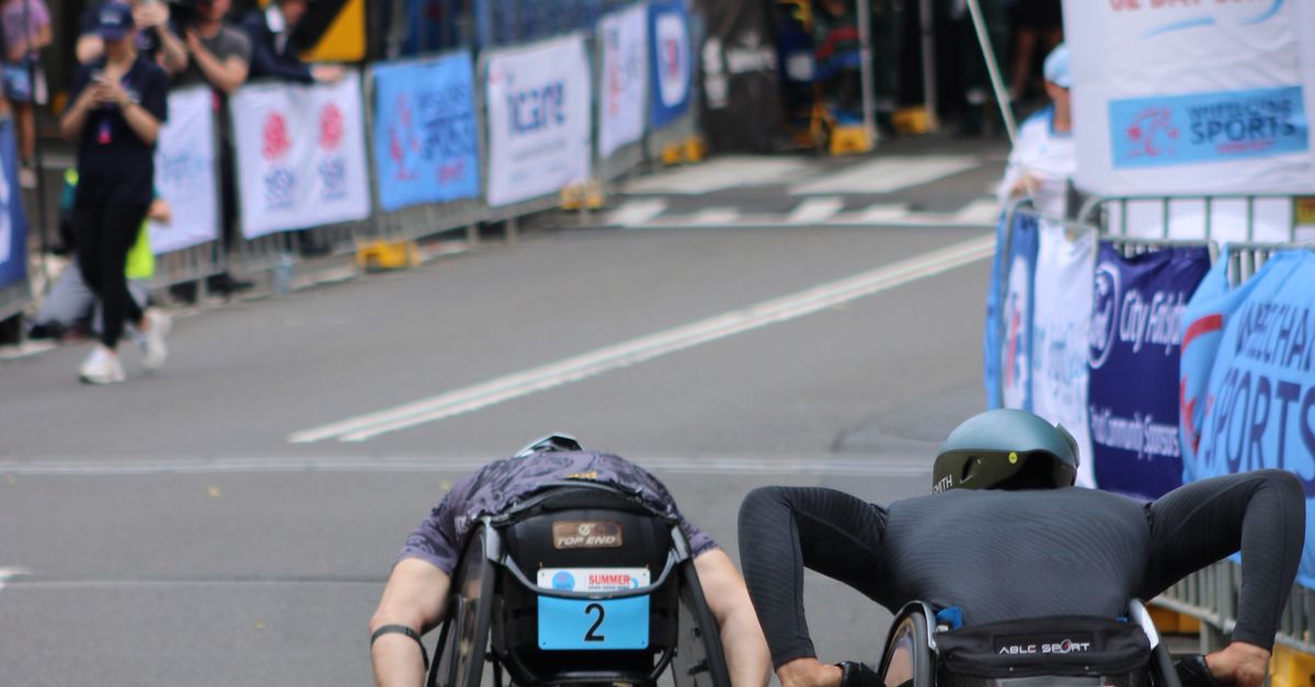 Althletes Racing Wheelchair Athletes Racing Toward Finish Line · Free Stock Photo