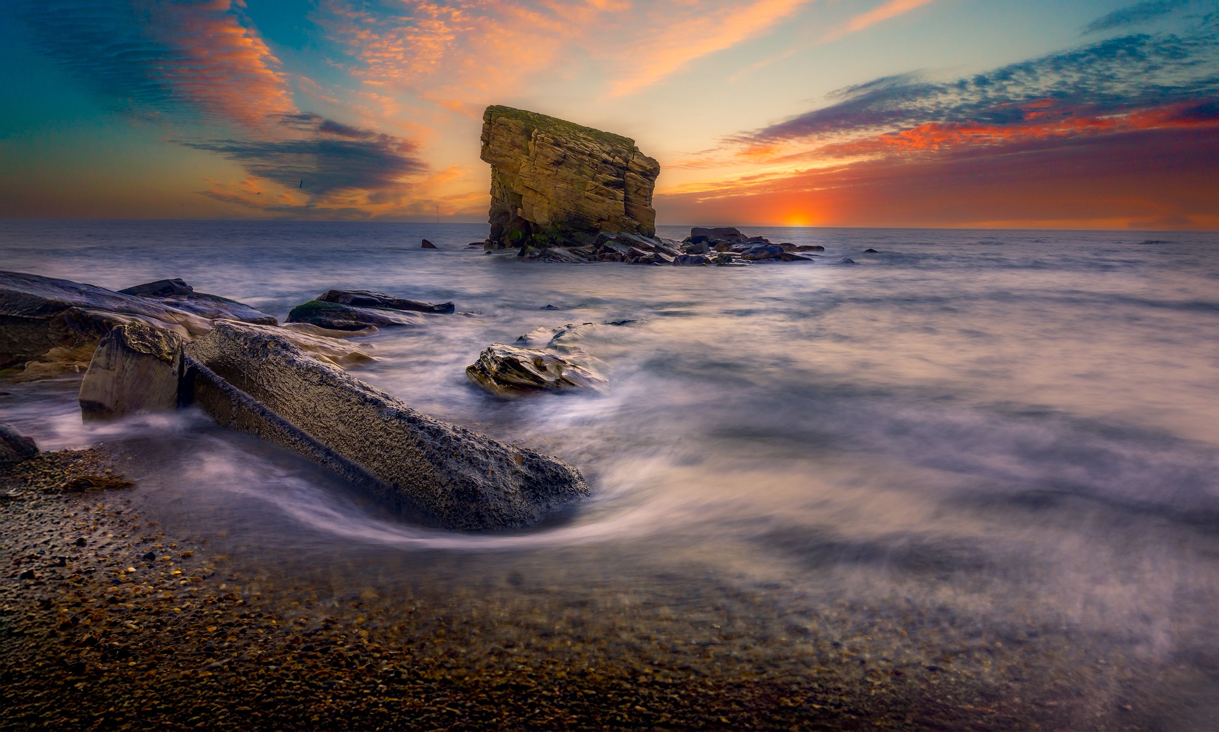 Gray Stone on Grassy Field during Under Cloudy Sky during Sunset · Free ...