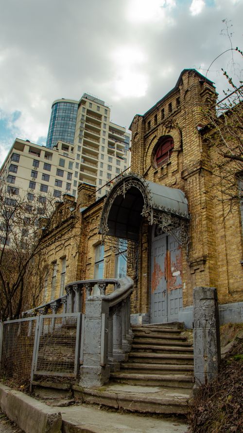 Free Contrast of old and new architecture in Kyiv, Ukraine. Historic building meets modern skyline. Stock Photo