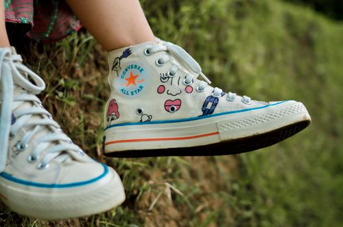 Free Close-up of colorful Converse sneakers outdoors in Indonesia. Stock Photo