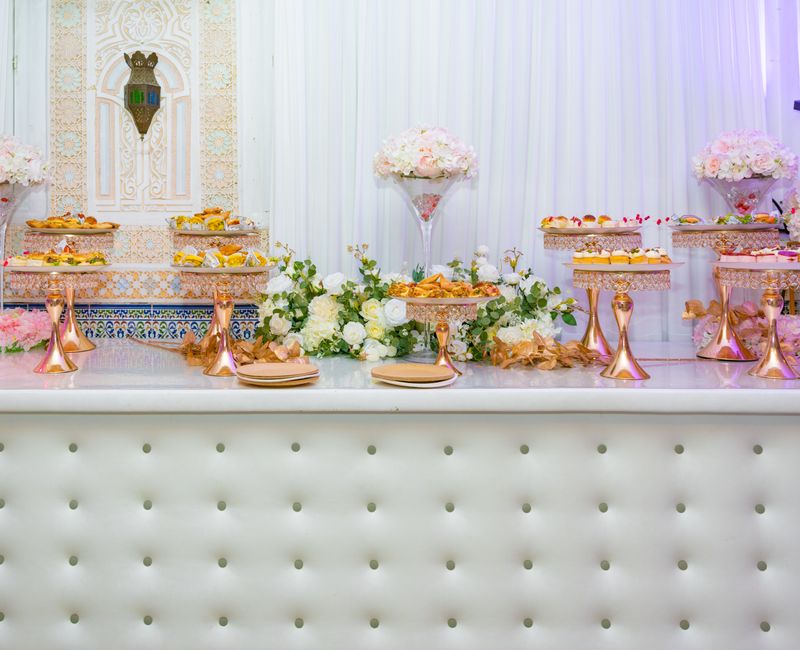 Traditional Moroccan desserts displayed on a decorative table