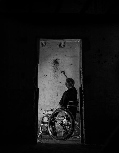 Free Man On A Wheelchair Stock Photo
