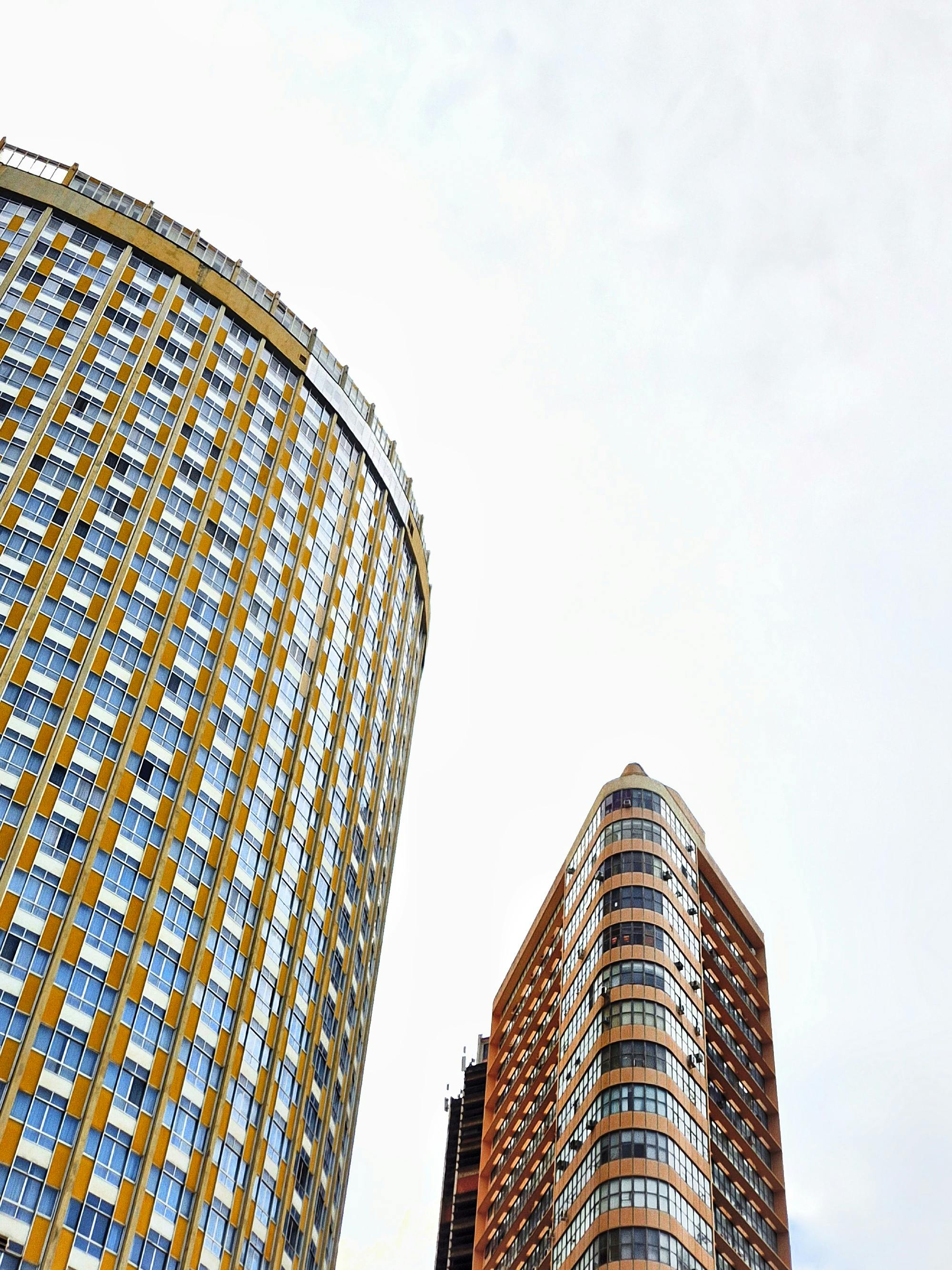 Vertical shot of modern high-rise buildings in Belo Horizonte, Brazil, showcasing urban architecture.