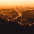 Amber Hours cover — hazy golden freeway, photo by John Wayne on Pexels
