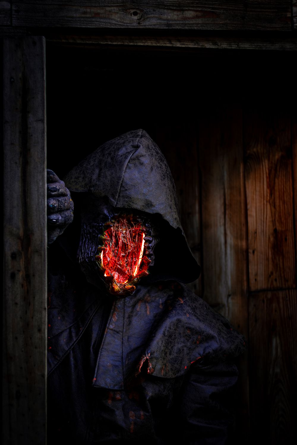 Mysterious Hooded Figure with Glowing Mask · Free Stock Photo