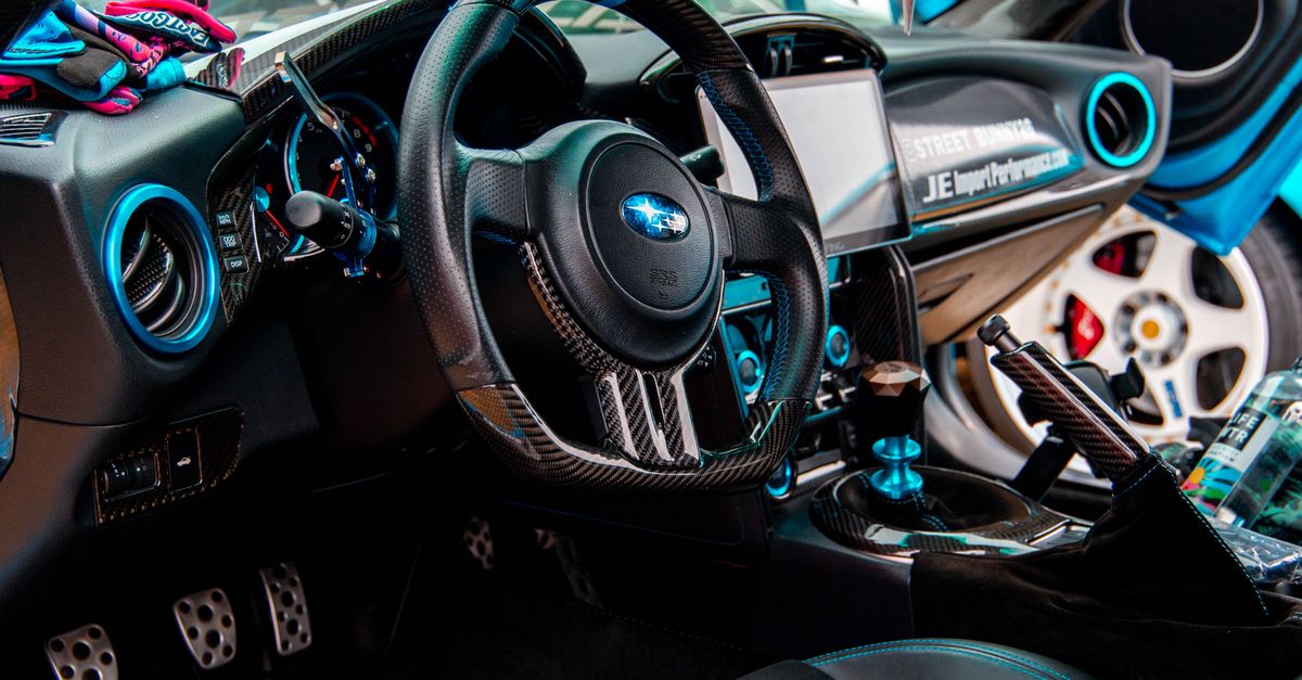 Vibrant sports car interior with racing details · Free Stock Photo