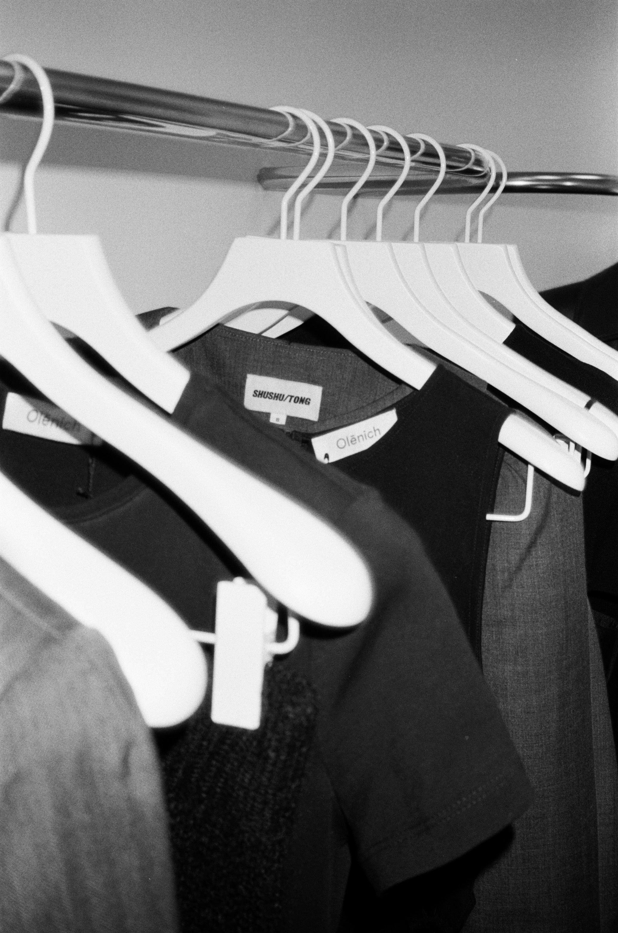 Black and White Fashion on Clothes Rack · Free Stock Photo