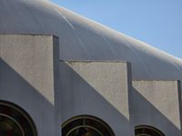 Geometric shadow on a concrete facade. Photo by YM66 Chow on Pexels