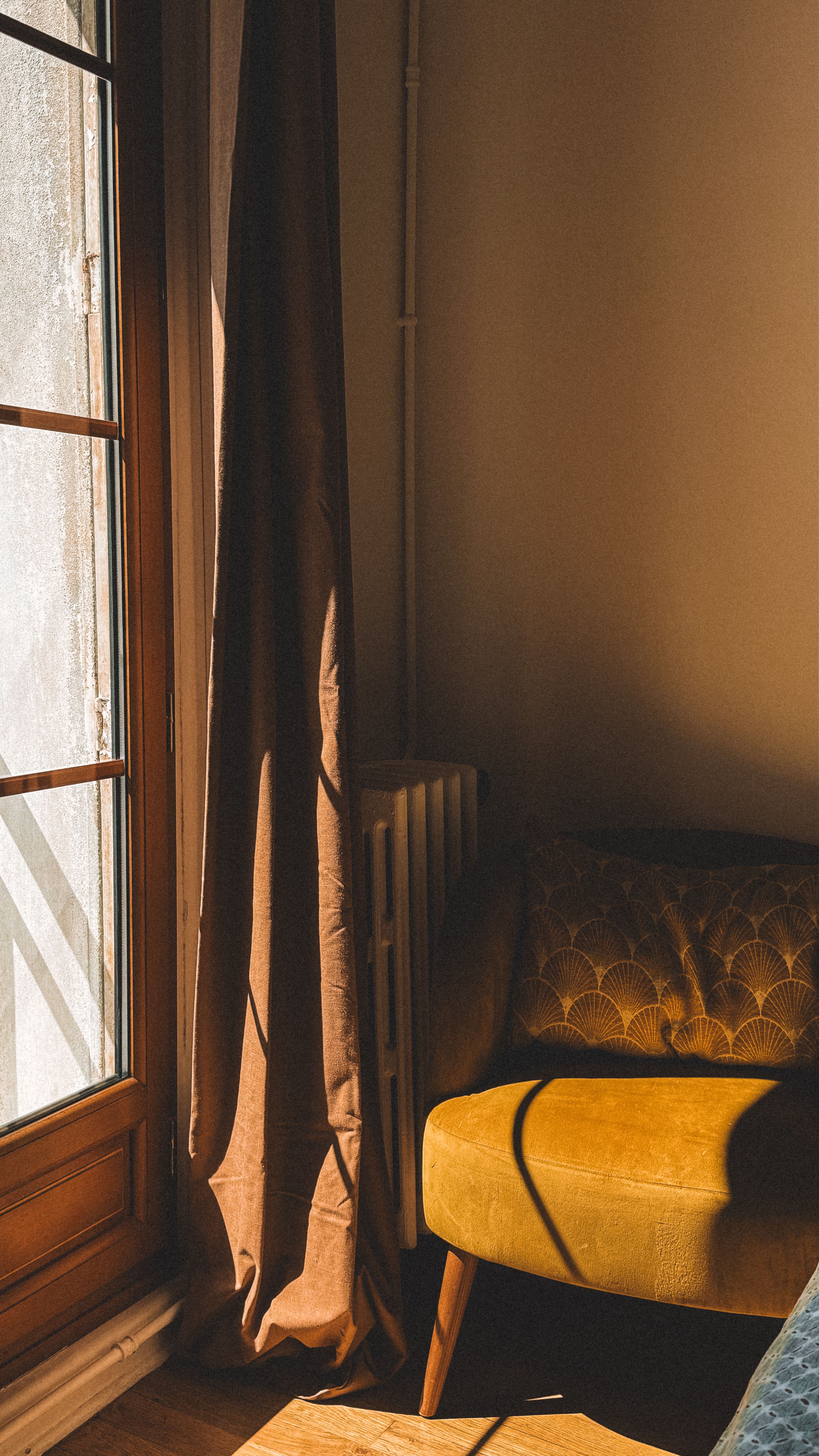 Cozy Sunlit Corner with Vintage Style Armchair · Free Stock Photo