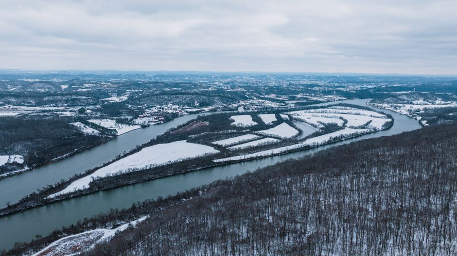 Best Extended Douglas Lake Region Tour by Helicopter Review: Soaring Over Tennessee's Hidden Gem Review 2026 - Snow-covered landscape along the winding Tennessee River in Chattanooga, Tennessee.