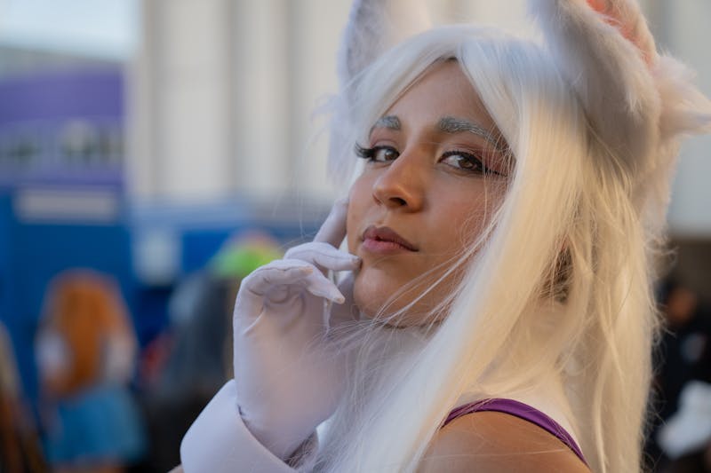 Cosplayer in anime-inspired costume at a convention