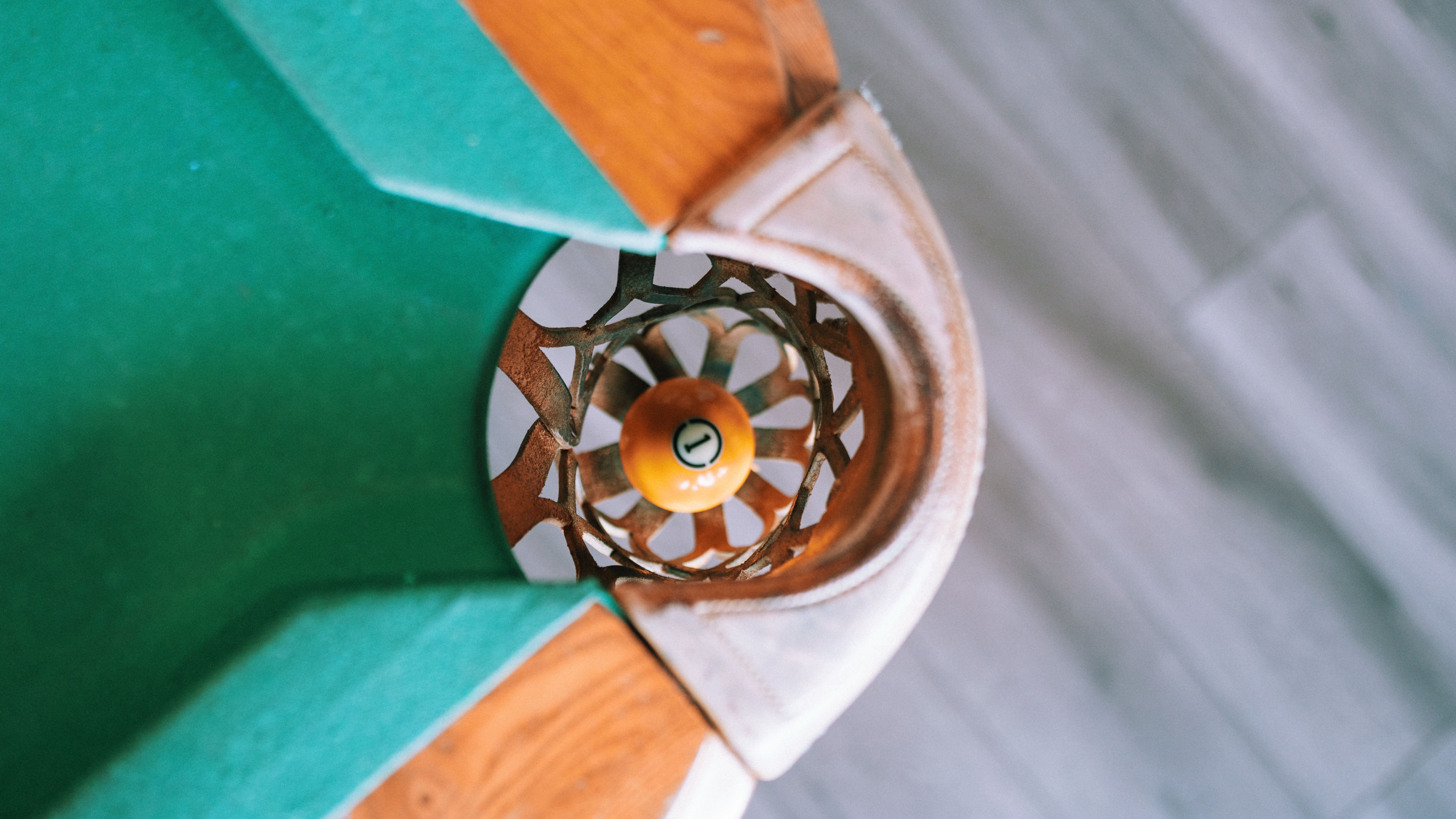 Top-down view of billiard ball in pocket · Free Stock Photo