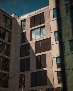 Facade of a modern office building in Berlin, showcasing geometric architectural design.