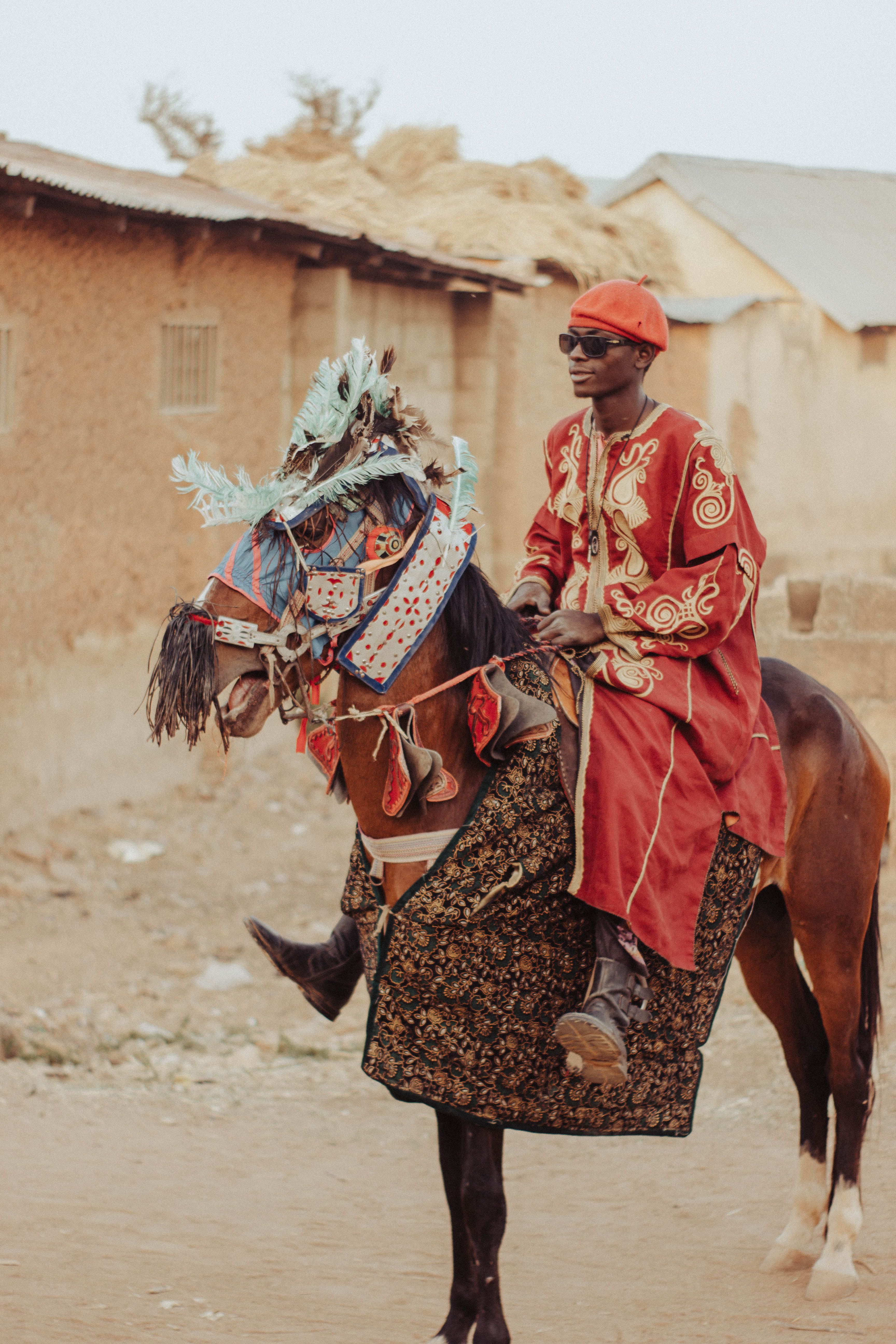 Traditional Horse Rider in Vibrant African Attire · Free Stock Photo