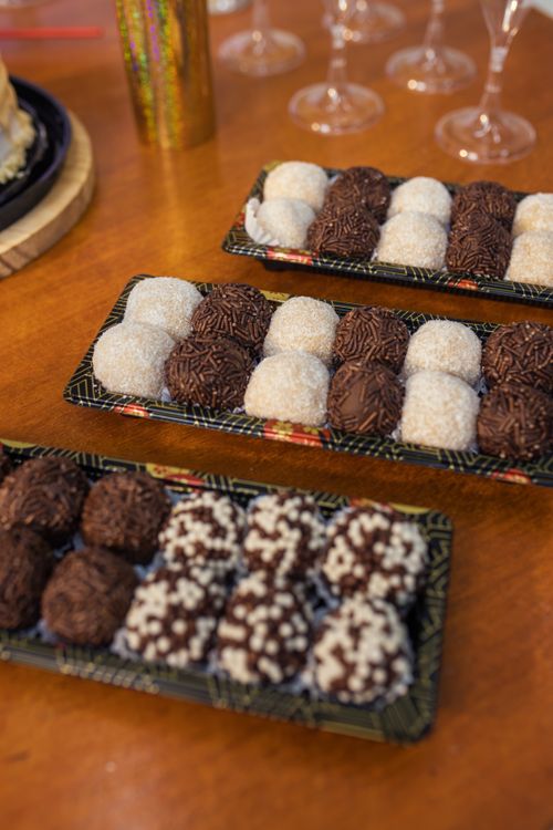 Free Close-up of assorted Brazilian brigadeiros on a table, perfect for celebrations. Stock Photo