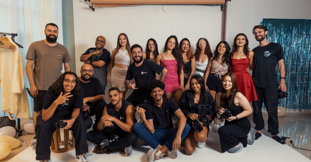 Dynamic Group Portrait Group Portrait of Photographers in a Studio Setting · Free Stock Photo