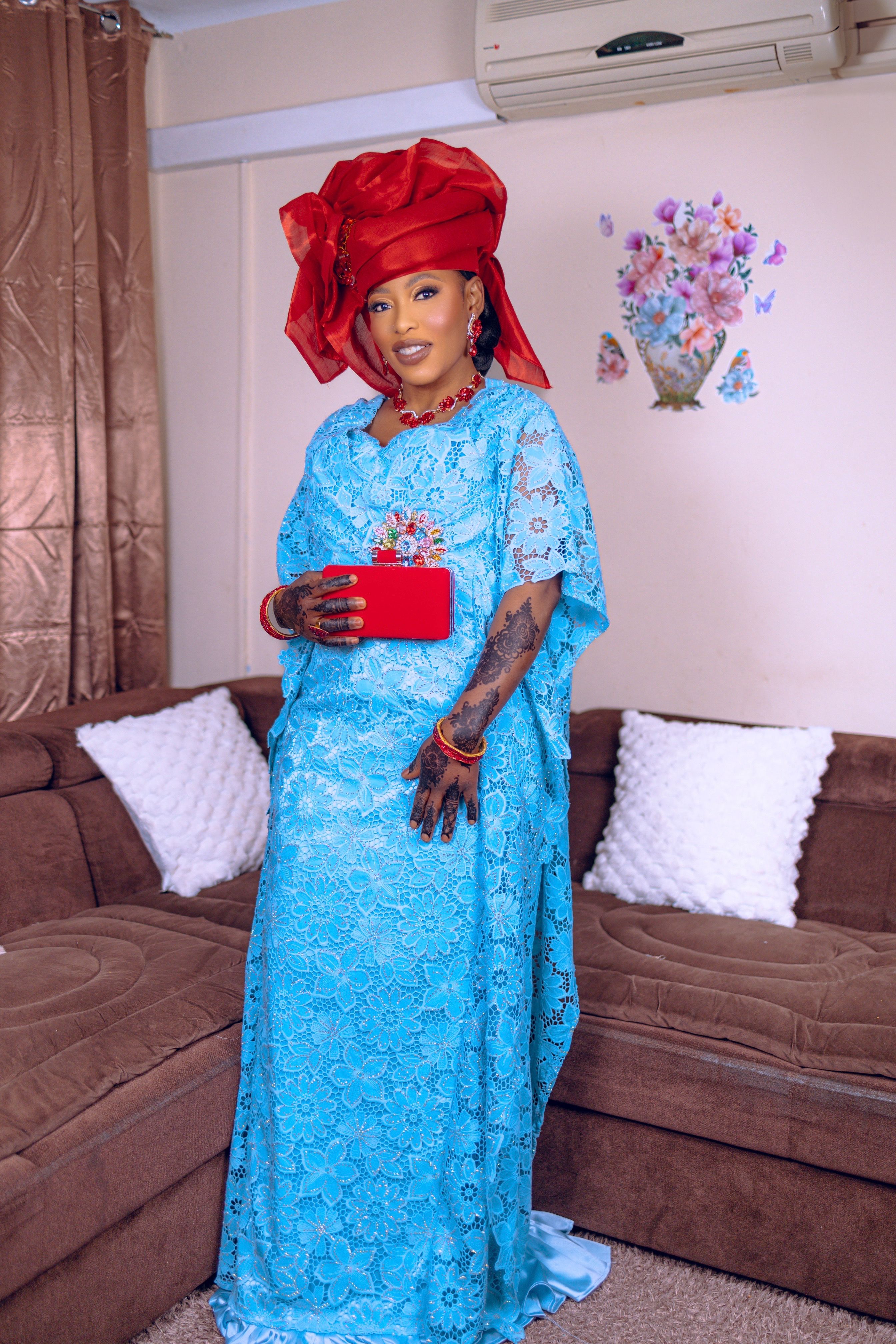 Elegant Woman in Traditional Blue Attire Indoors · Free Stock Photo
