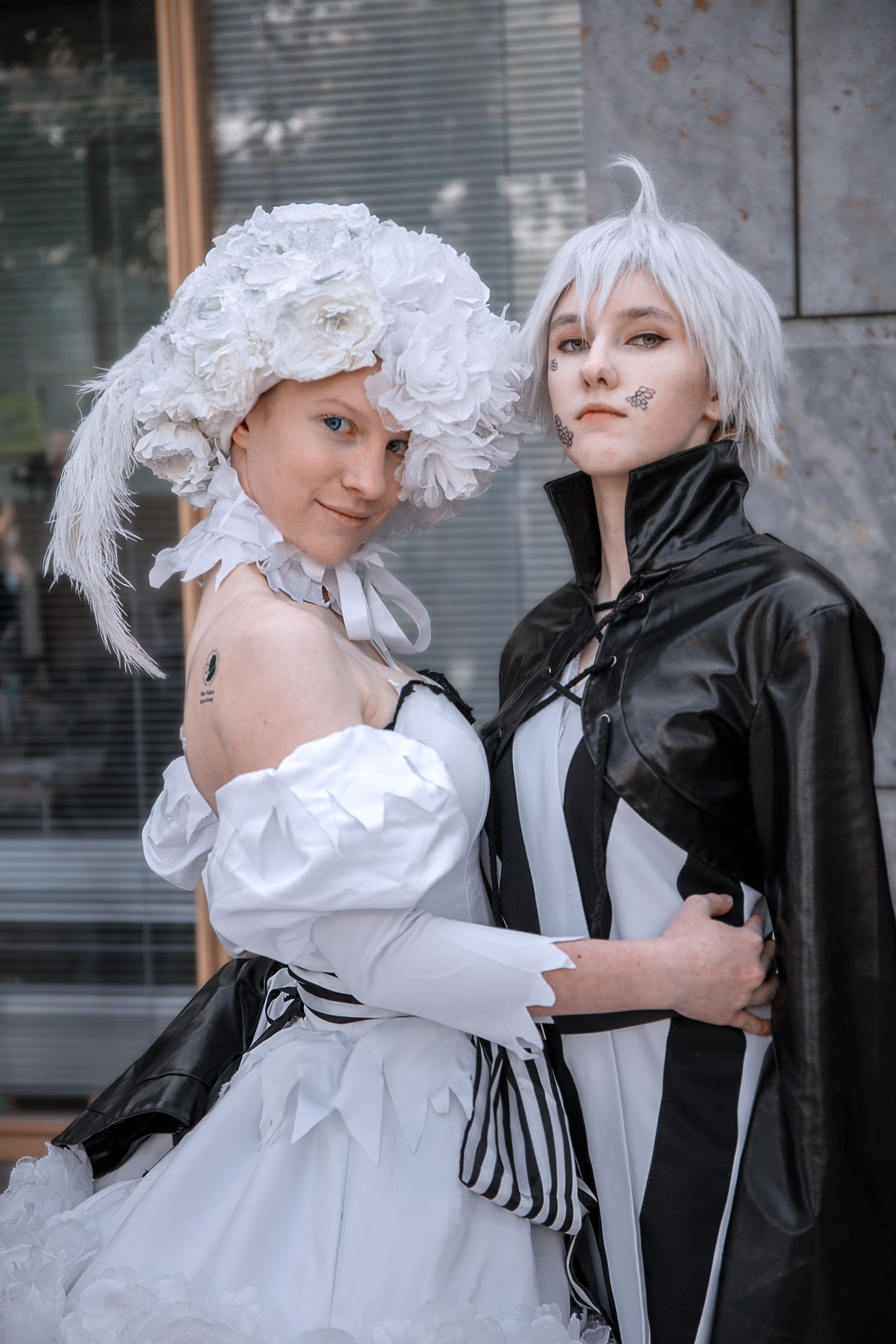 Elegant Cosplay Portrait of Two Characters · Free Stock Photo
