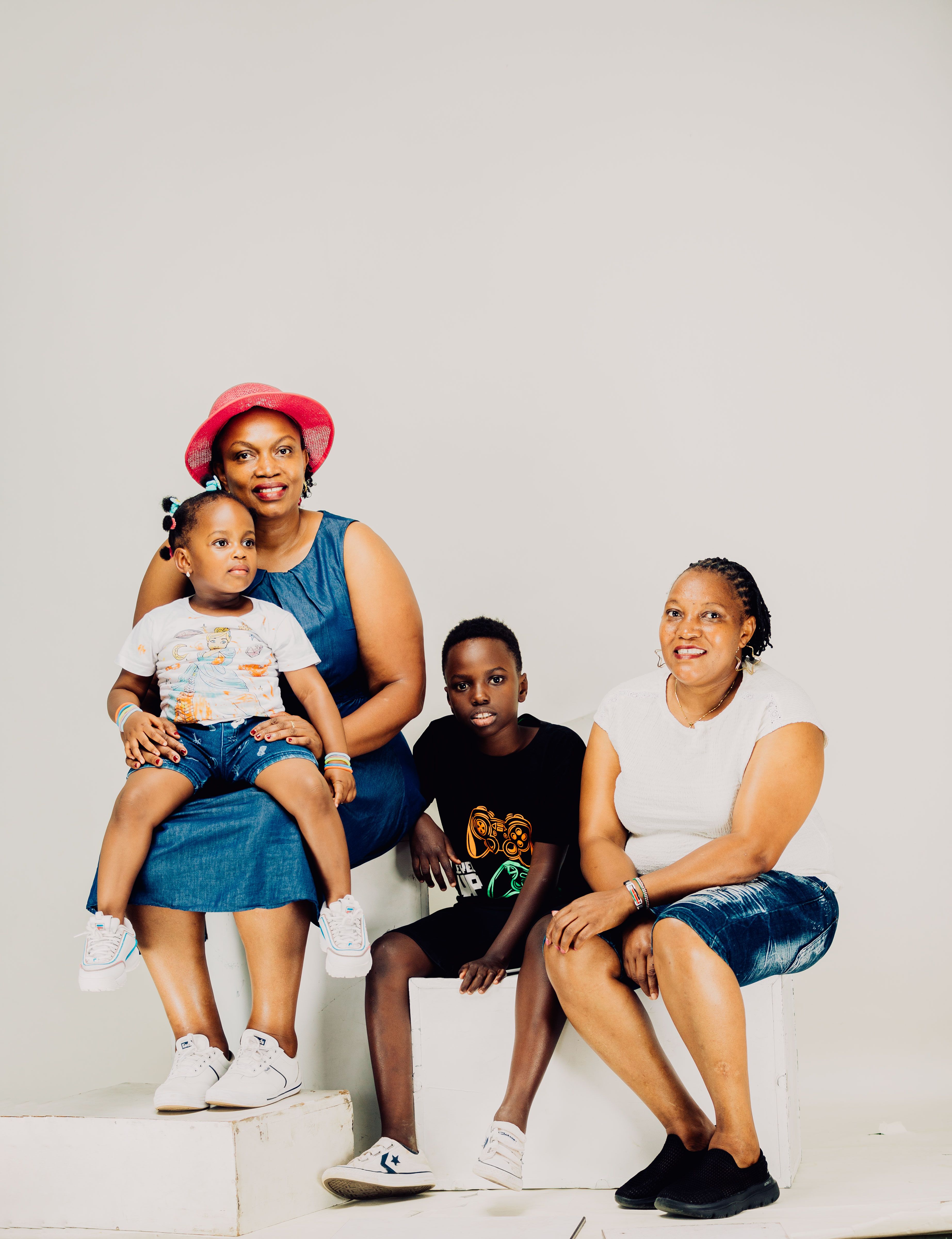 Family Portrait of Three Generations Smiling · Free Stock Photo
