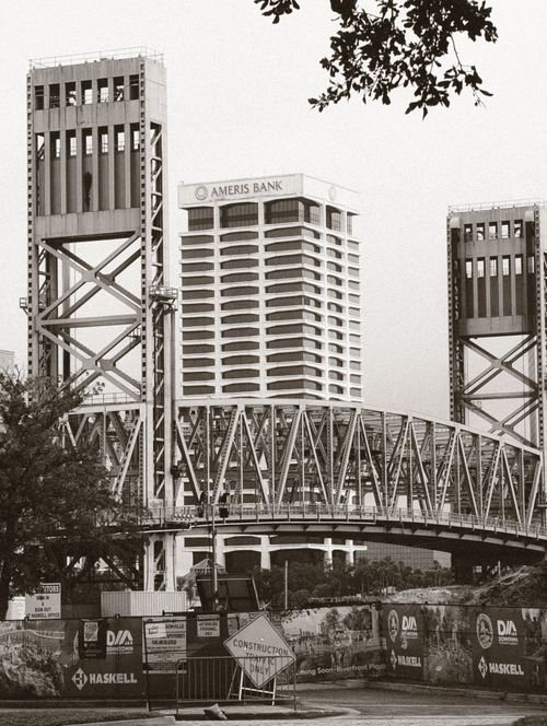 Free Monochrome image of Jacksonville lift bridge and Ameris Bank tower on a cloudy day. Stock Photo