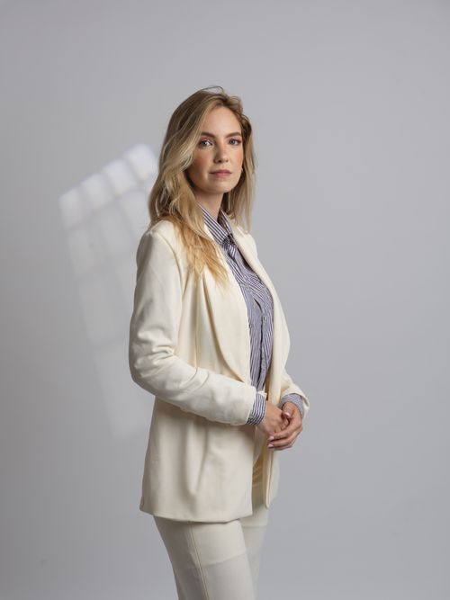 Free Elegant portrait of a professional woman dressed in stylish business attire. Stock Photo