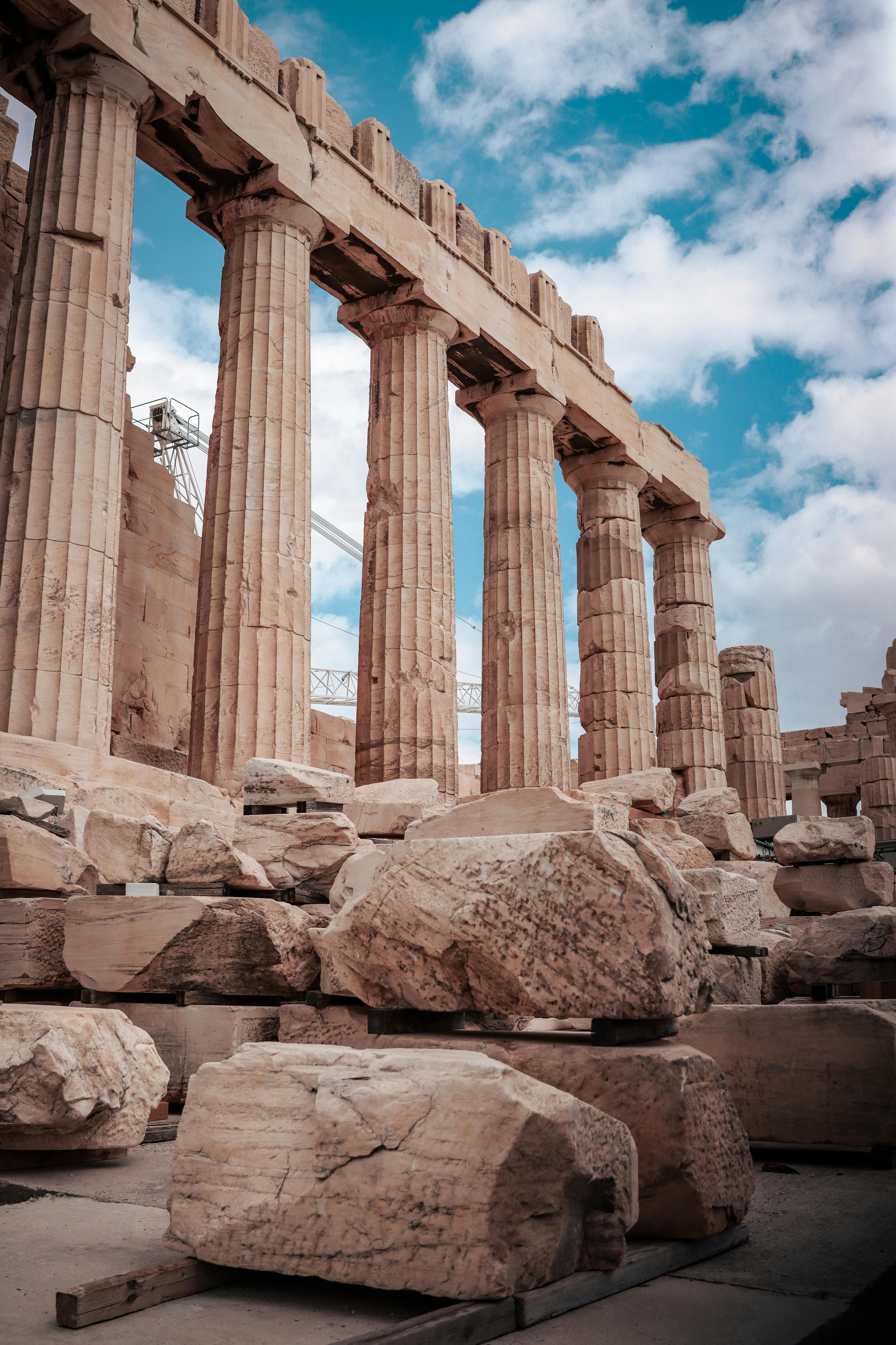 iconic parthenon ruins against blue sky in athens