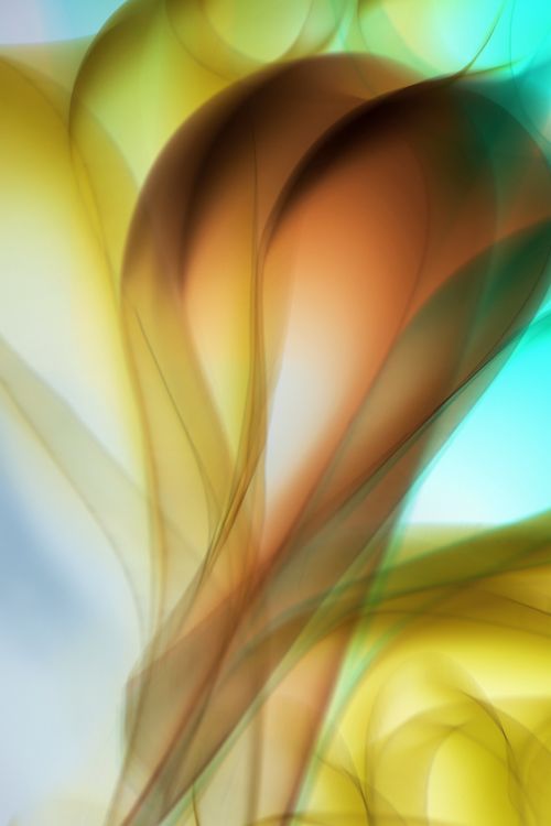 Free Vibrant abstract image with flowing shapes in warm tones of yellow, brown, and turquoise. Stock Photo