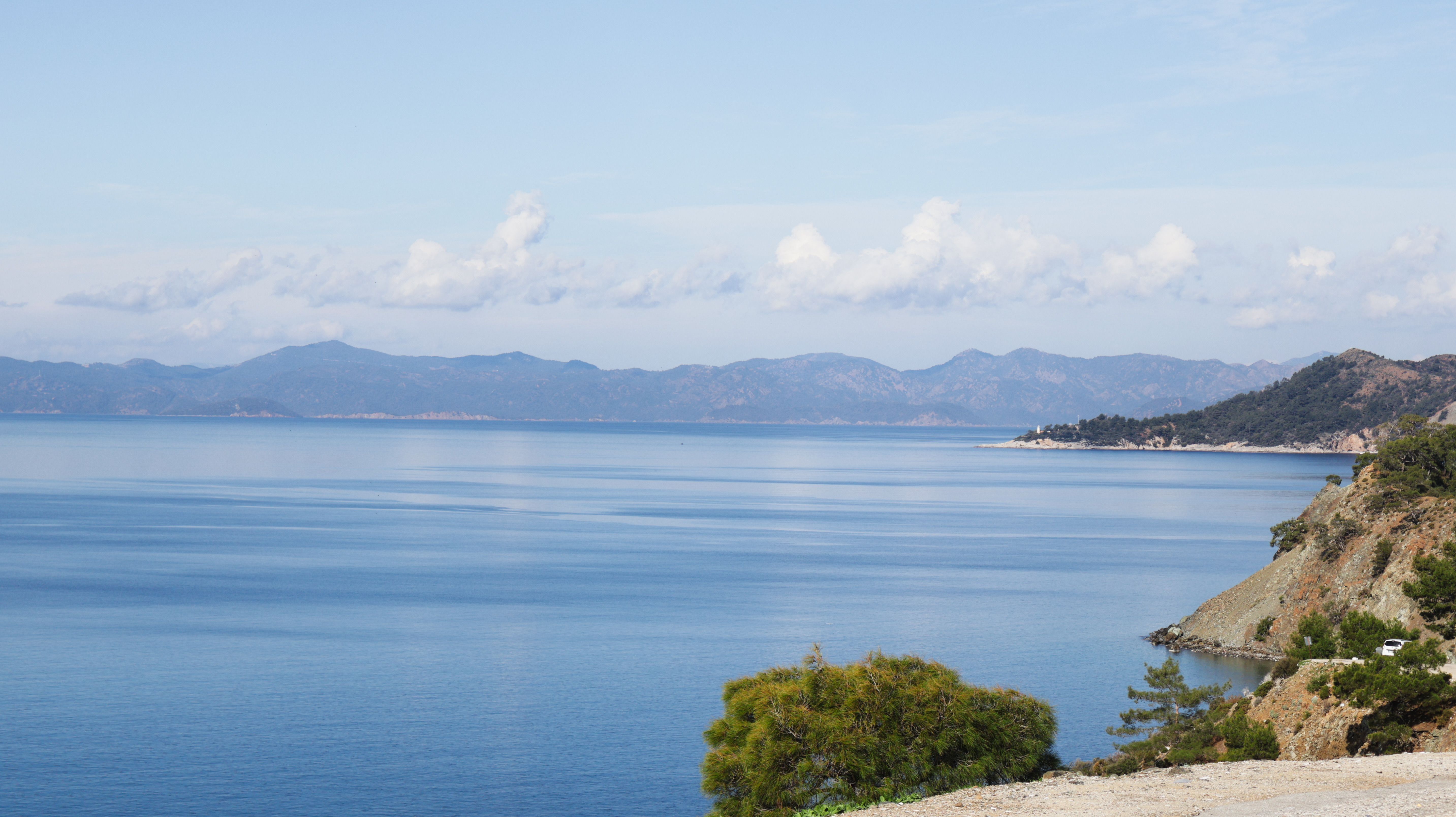 Serene Coastal Landscape with Rocky Cliffs · Free Stock Photo