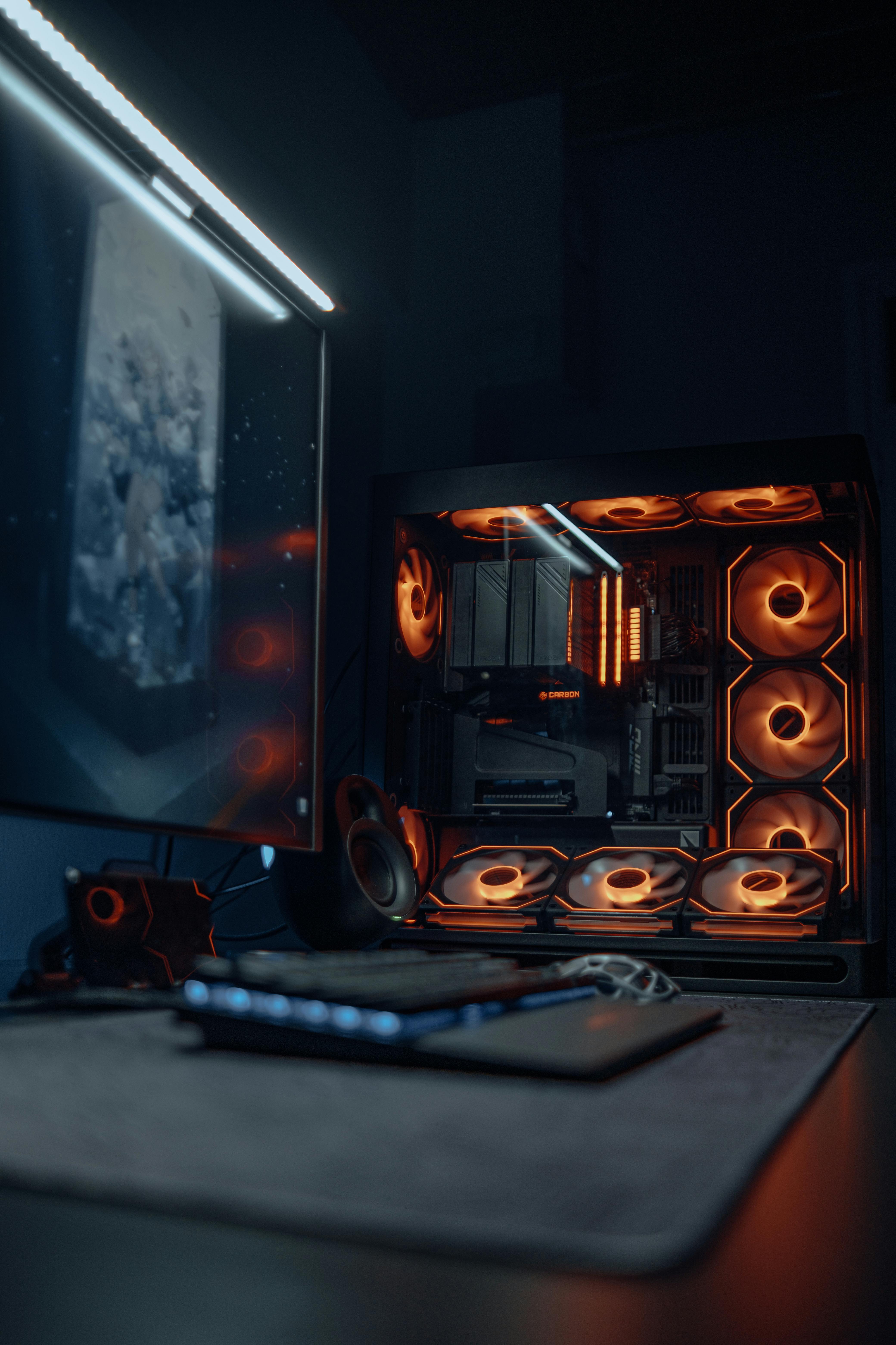 A sleek gaming PC setup with vibrant RGB lighting and a high-resolution monitor.