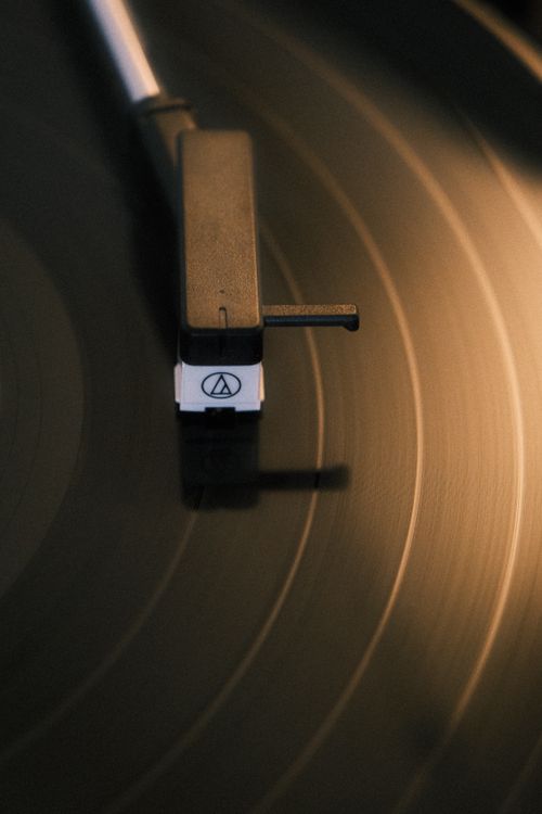 Free Close-up view of a vinyl record player with a nostalgic, vintage feel. Stock Photo