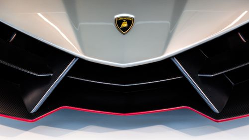 Free Detailed close-up of a Lamborghini front bumper showing sleek design elements. Stock Photo