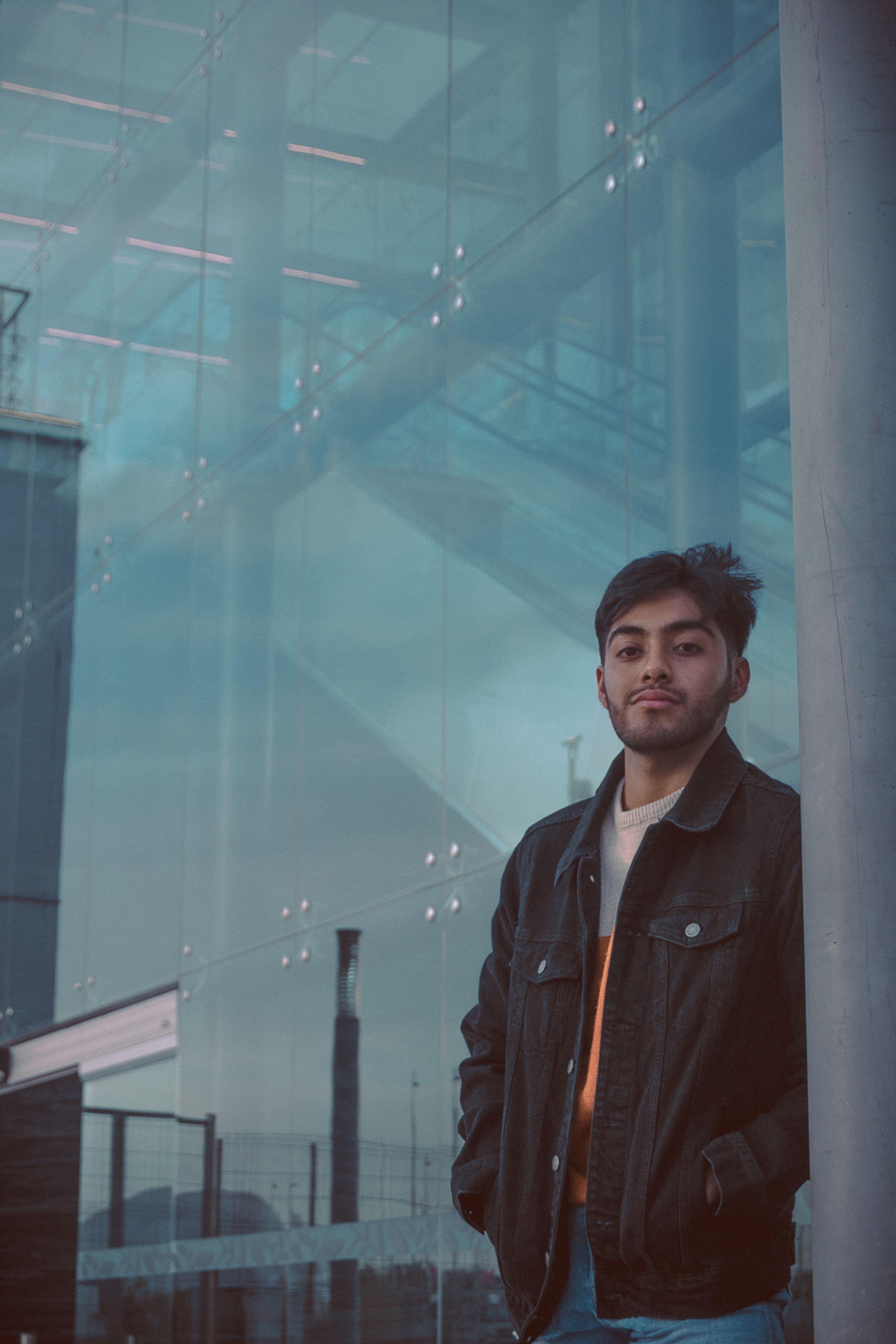 Portrait of a Young Man in Urban Setting · Free Stock Photo